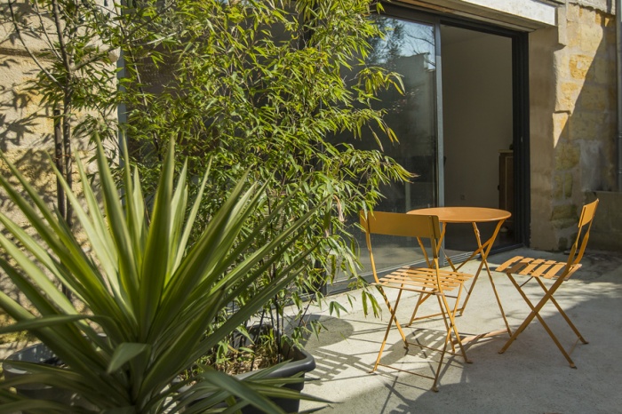 Sur�l�vation et r�am�nagement  d'une maison d'habitation : terrasse